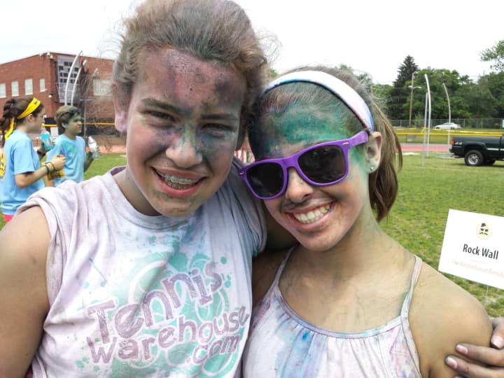 Alana Kerner, left, and Olivia Lopez, both students at the Benjamin Franklin Middle School, participated in the color run.