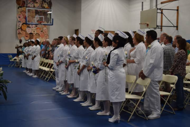The graduates of the BOCES nursing program line up for commencement.