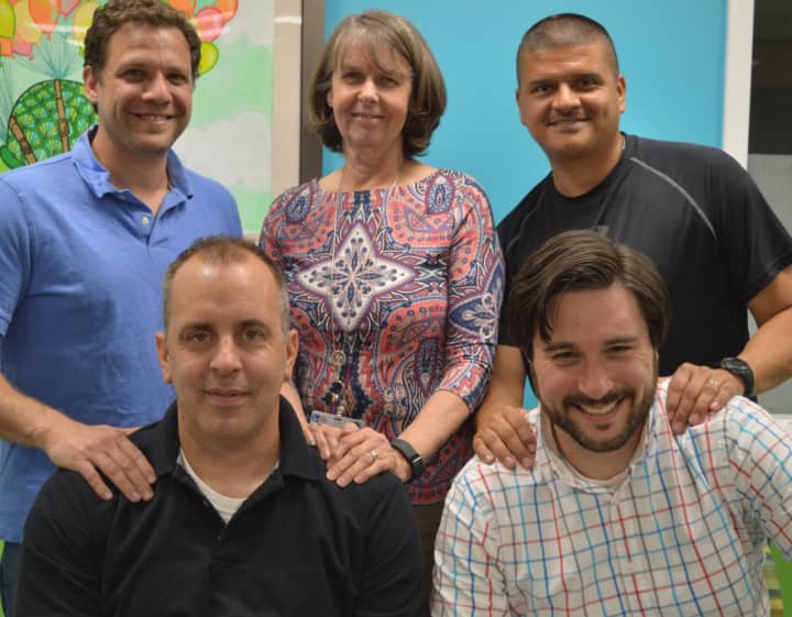 The men&#x27;s support group, front row, from the left, Rich Lindemulder, Dan Librot. Back row, from the left, Adam Yoskowitz, Trudy Heerema, and Rey Rosado.