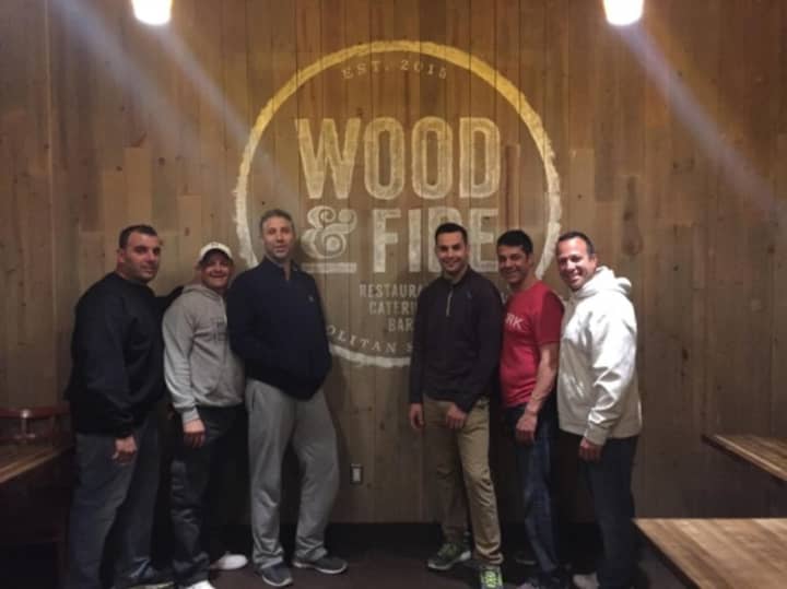 Wood &amp; Fire, a new informal dining spot in Pleasantville, sells pizza and a large selection of pastas, according to a story in The New York Times.