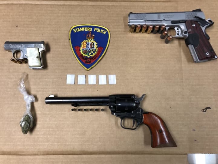 Four men were busted attempting to sell guns with an 18-month-old child in the vehicle.