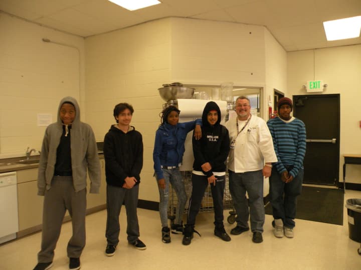 &quot;Cheffy&quot; Stanley Rupinski with students of his culinary class at Fox Meadow Middle/High School.
