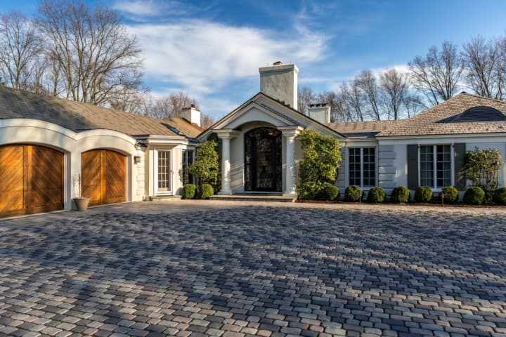 This Refined Luxury Custom Home Is Located On One Of Darien&#x27;s Most Prestigious Streets.
