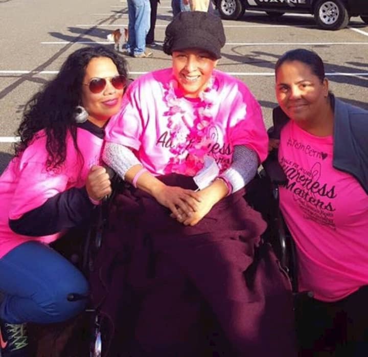 Veronica Rosario-Jackson, left, with Bernadette Vargas, center, and Sonia Aviles, right, after a breast cancer awareness walk in Wayne this fall.