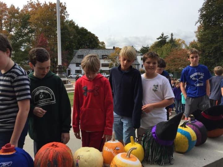 Sixth-grade students at Bronxville School line up for the Oct. 27 pumpkin display.