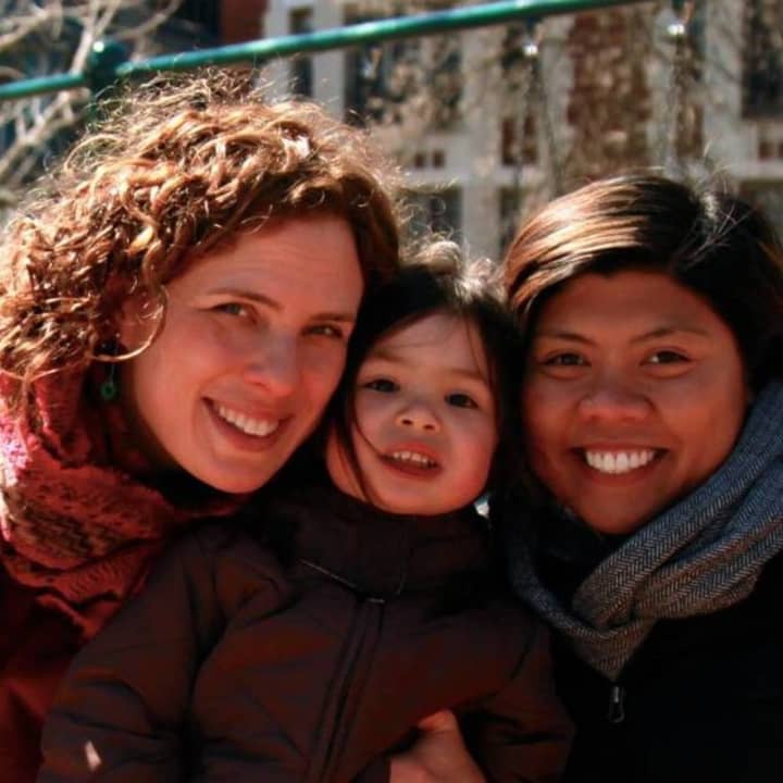 Leah Fowler, left, with her daughter and wife.
