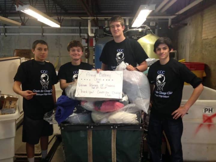 Mahopac High School Create the Change members Joseph Tetto, Patrick Salerno, Derek Quirke, and Cooper Aquilino, with clothing donations the club collected for veterans.