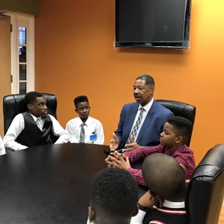Mount Vernon Schools Superintendent Kenneth Hamilton with several students.