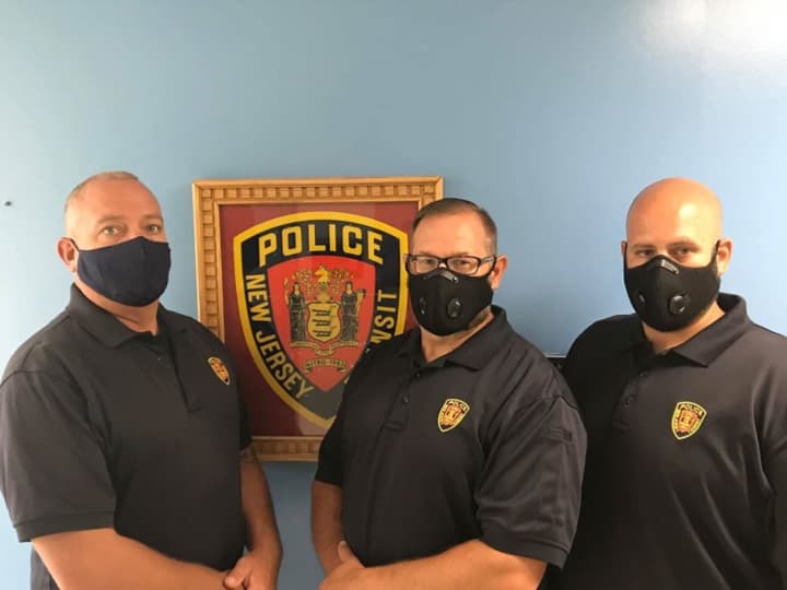 From left to right, NJ Transit Police Officers Gary Denamen, Gary Timmons and Joseph Carullo⁣.