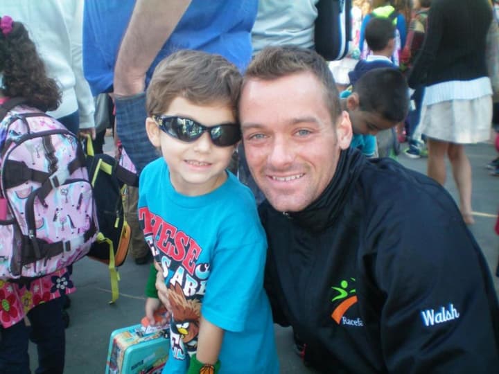 Aidan Walsh, owner of Ridgewood&#x27;s Racefaster, LLC, and his 7-year-old son.