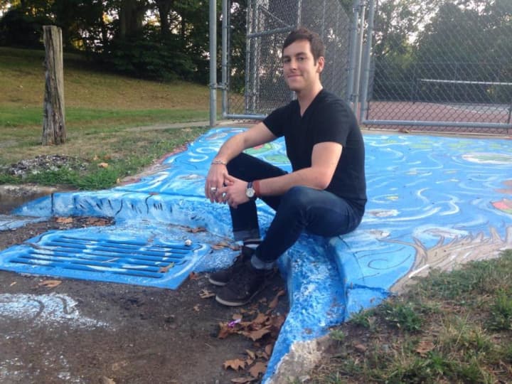 Borough resident Keith Griffiths with his first piece of street art in Andreas Park, in Teaneck.