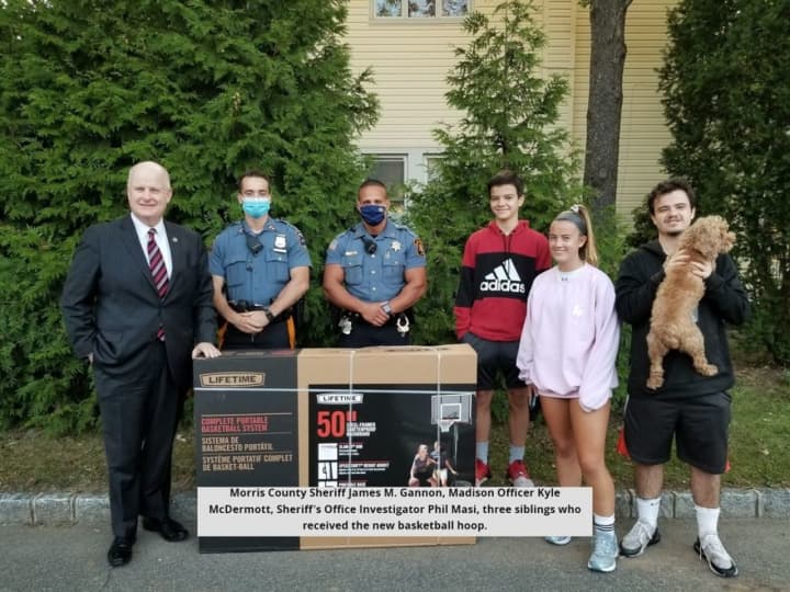 Four children from Madison were caught entirely off-guard when borough police surprised the family with a brand new portable basketball hoop to replace the one that had gotten destroyed during Tropical Storm Isaias in August.