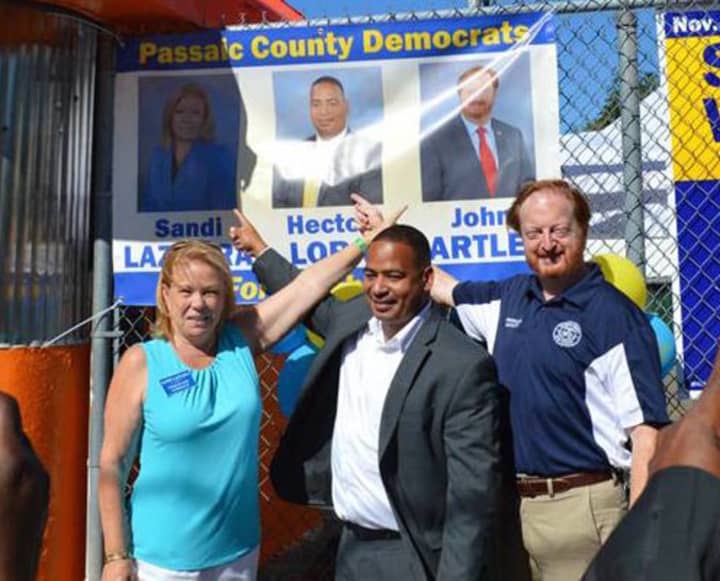 Passaic County Freeholders Cassandra Lazzara, Hector Lora and John Bartlett.
