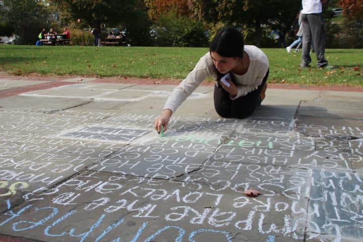  Scarsdale High School students participated in &quot;Sounds of Sonnets&quot; poem chalking event last week.