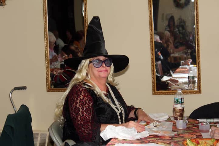 A senior dressed as a witch.