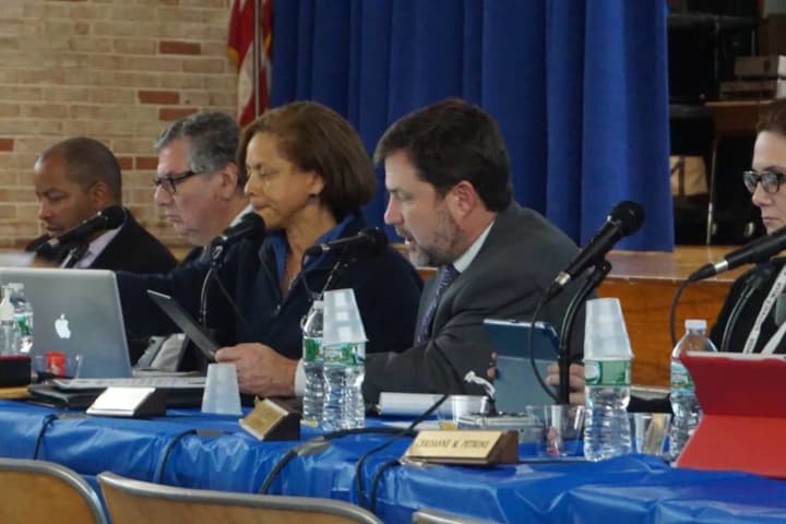 New Rochelle school officials - here at a previous Board of Education meeting - discussing the capital bonds project, which was approved on Tuesday.