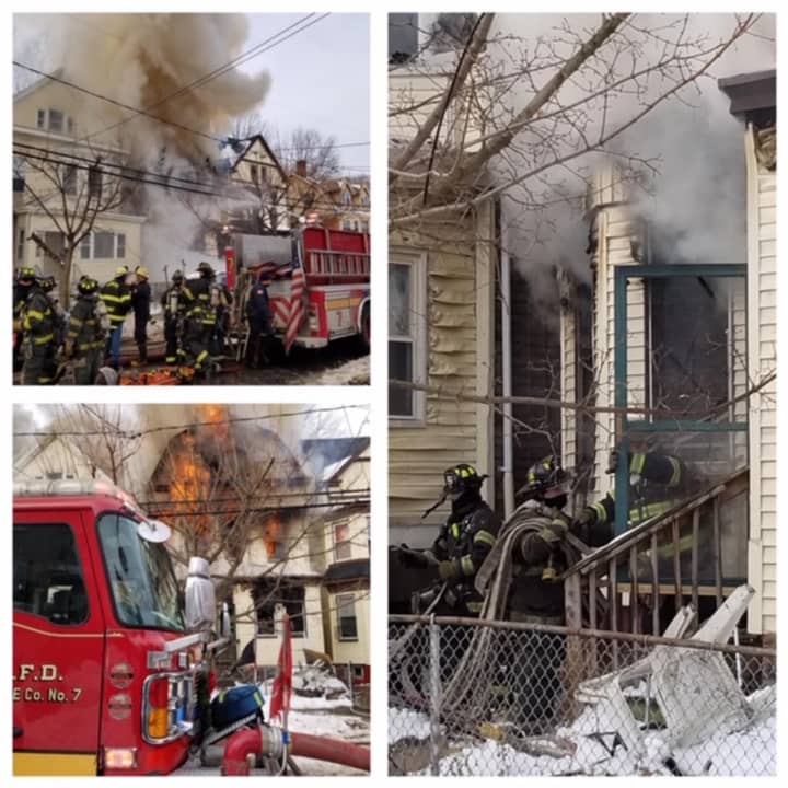 Approximately 90 Newark firefighters worked to knock down the South 11th Street house fire, which sent a teen boy to the hospital and displaced a family of five, authorities said.