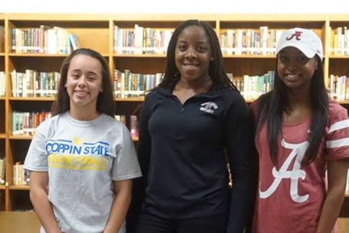 Kayla Correa, Monae Cooper and Symone Darius signed letters of intent.