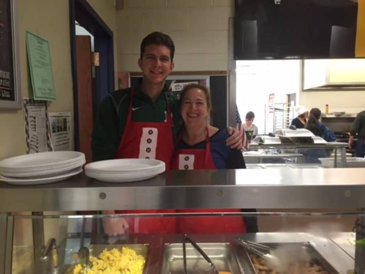 Middle School administrators Viv Ossowski and Don Marra led volunteers at Saturday&#x27;s pancake breakfast.