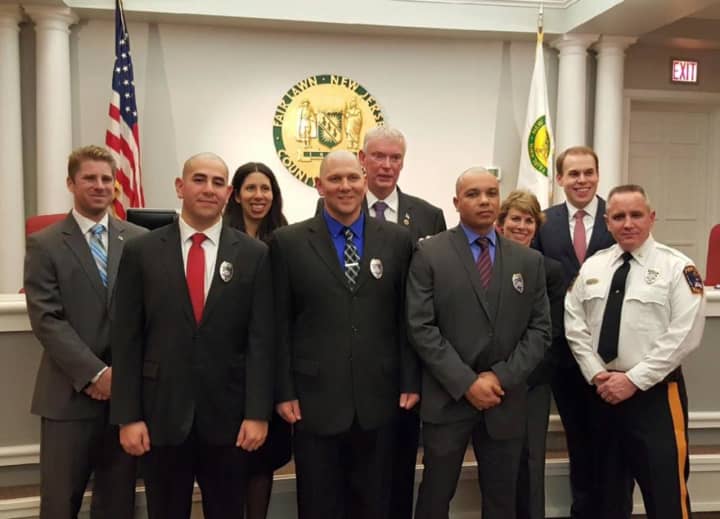 (L to R): Geovanny Buitron, Michael Van Ness, and Tiller Uriarte surrounded by the Fair Lawn Borough Council and Police Chief Glen Cauwels.