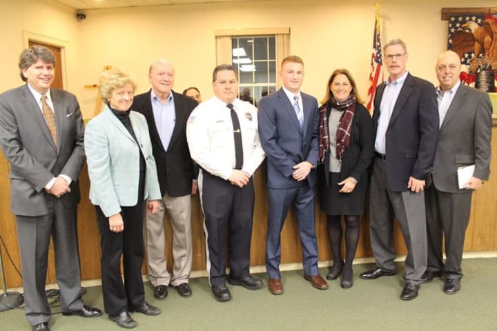 Franklin Lakes officials with the new police officers.