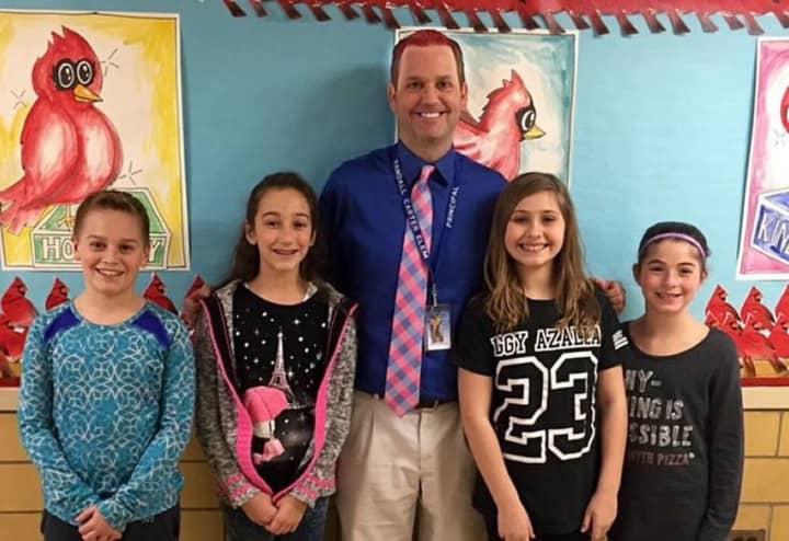Principal Scot Burkholde donned pink hair for the day when the kids met the &quot;Great Kindness Challenge.&quot;