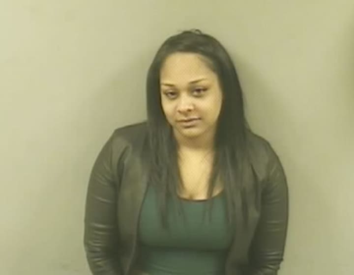 Crystal Burden received multiple charges after police said she fell asleep behind the wheel on an I-95 off ramp in Norwalk.
