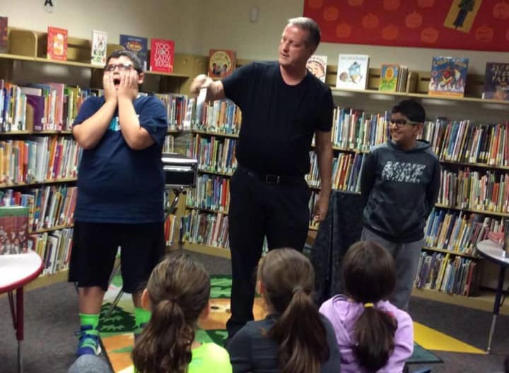 Magician Michael Healy will entertain kids at the &quot;Read Across America&quot; event on Feb. 29.