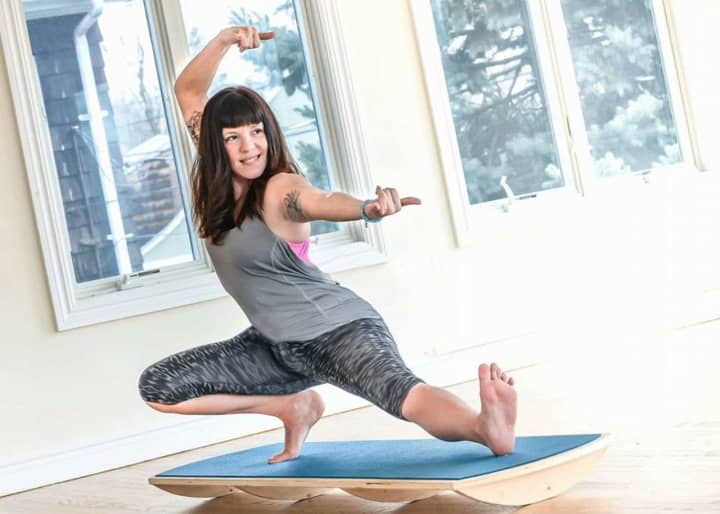 Andrea Powers invented an indoor paddle board for yoga.
