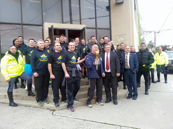 Yonkers Mayor Mike Spano kicks off the Law Enforcement Torch Run for Special Olympics NY in May. Active and retired Police Department members topped the list of the city&#x27;s highest earners, but not Spano, whose pay ranked 312, reports lohud.com.