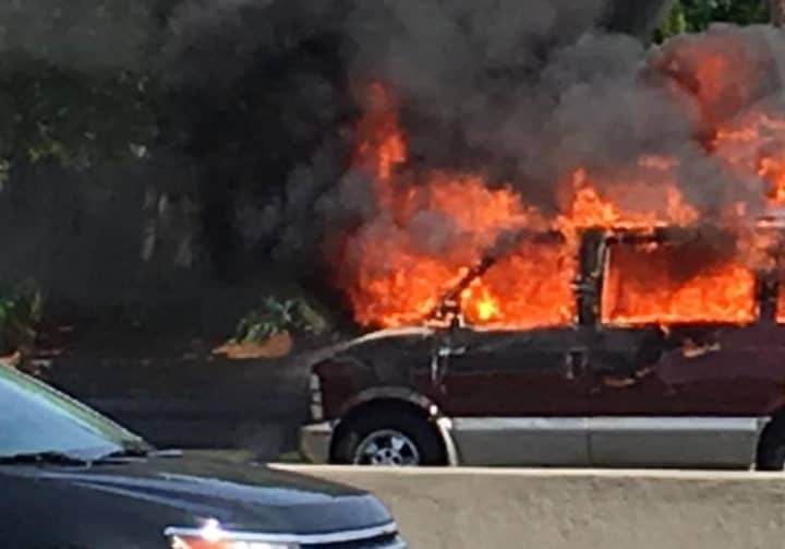 Flames quickly engulfed the van.