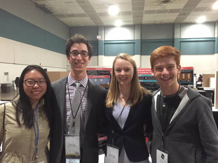 Alice Xue, left with other students at the Junior Science and Humanities Symposium.