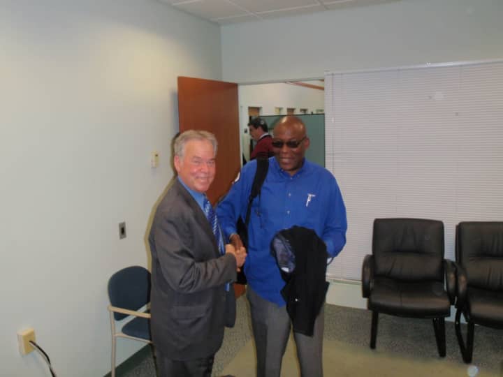County Executive Ed Day meets with Victor Muscadin of the county Department of Planning and Public Transportation.