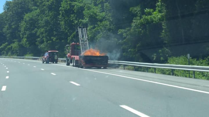 A dumpster caught on fire on I-87.