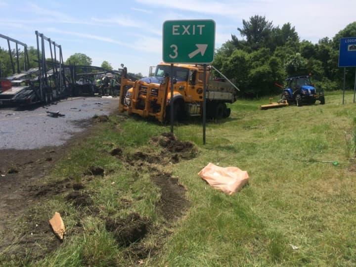 A collision on Interstate 684 moved a parked dump truck nearly 50 feet.
