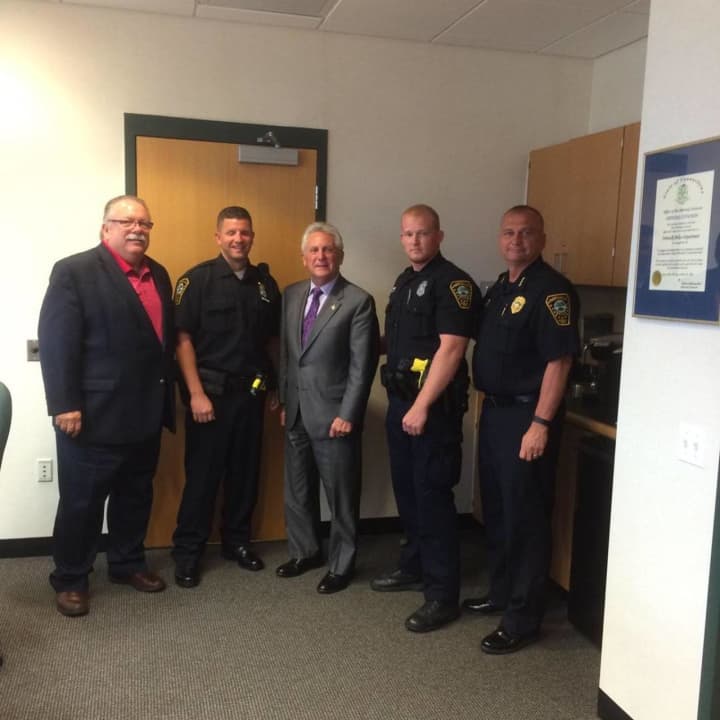 L to R: Commissioner Yost, Officer DePanfilis, Mayor Rilling, Officer Nyquist and Chief Kulhawik