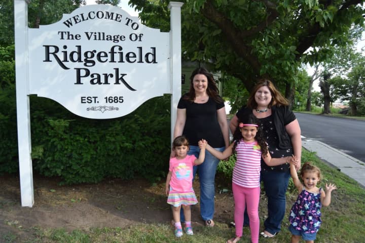 The popular Ridgefield Park Moms Facebook page was launched by longtime residents and sisters Joyce Essig-Bachtler and Elaine Marin, shown here with their daughters.