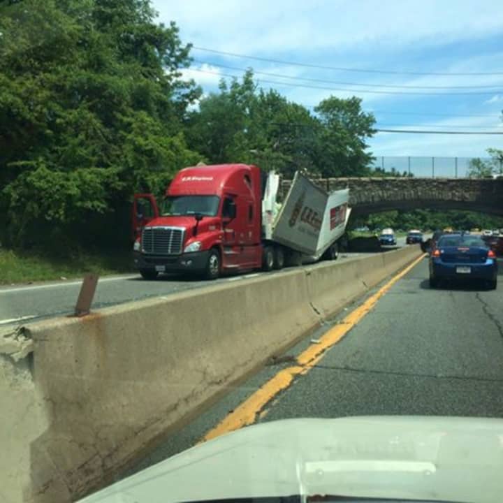 The tractor-trailer slammed into the Mamaroneck Road overpass between exists 21 and 22 on the Hutchinson River Parkway.