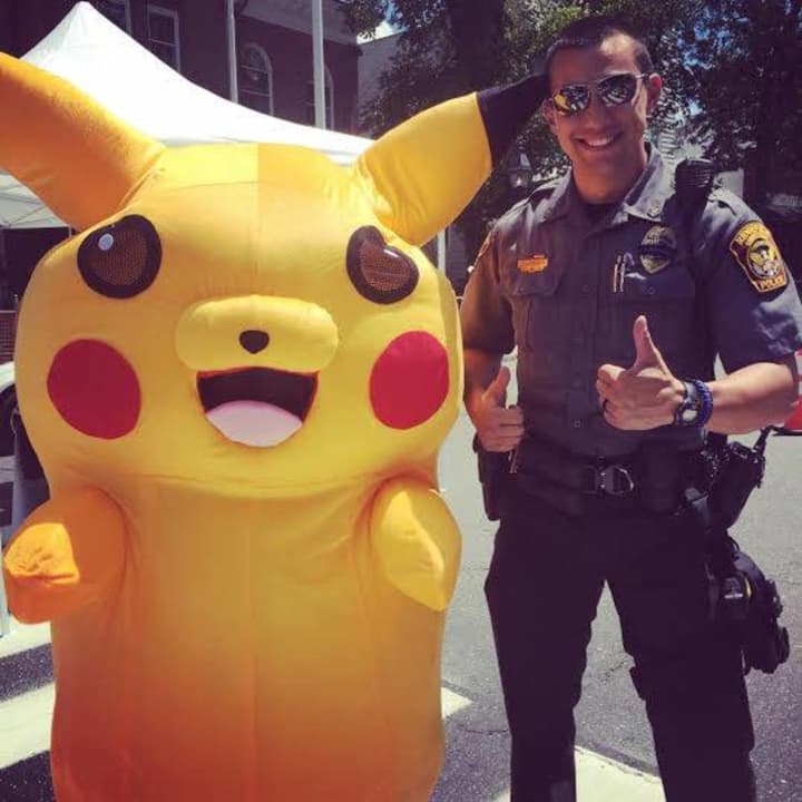 Officer James Van Wattum and Pikachu.