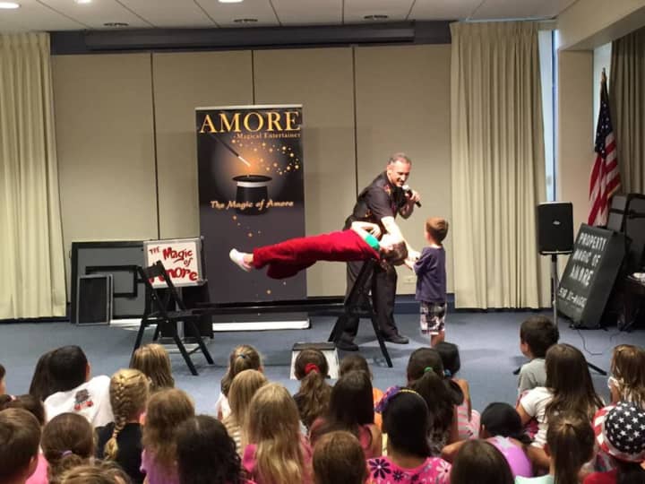 Magician Amore performed as the grand finale for 2016 Summer Reading Game at the Eastchester Library. The library started renovations Aug. 15.
