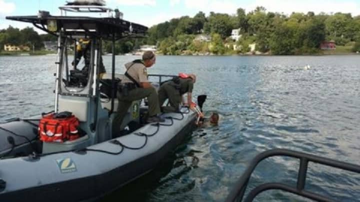 Divers from Brookfield Police Department&#x27;s dive team went into Candlewood Lake on Sept. 2 to find a boat that sank after a fire.
