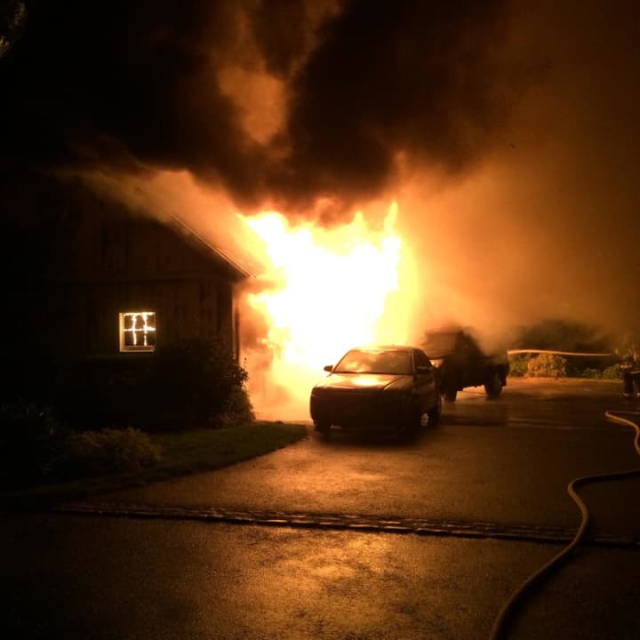 Norwalk fire fighters put out a garage fire Tuesday night.