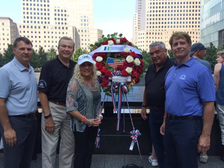 HUMC officials deliver a wreath to the Freedom Tower on the 16th Charity Run.
