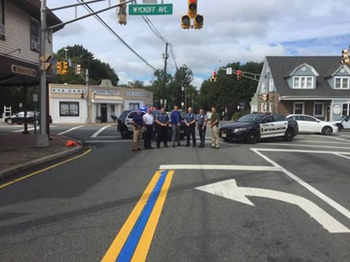 Wyckoff police, officials with thin blue line on Franklin Avenue early Tuesday.