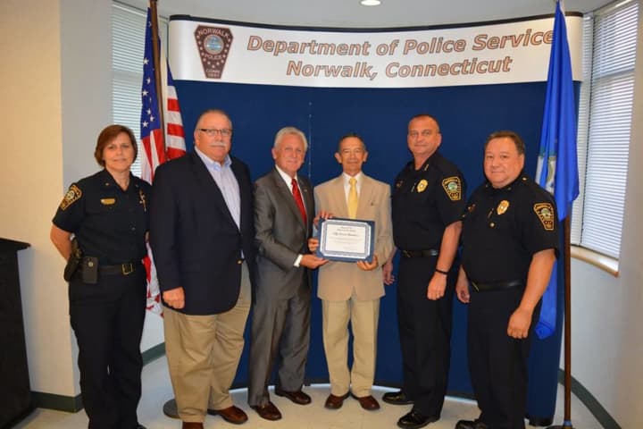 Cesar Ramirez was named Police Service Officer of the Month in Norwalk for his work organizing an interfaith prayer vigil on Aug. 3.