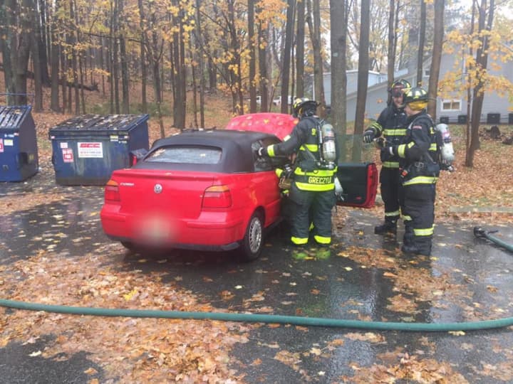 Members of the Somers Fire  Department  extinguished a car fire on Friday.