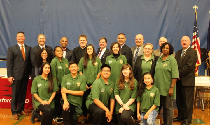 Elmsford teens, along with Schools Superintendent Joseph Ricca on the left, Elmsford School Board trustees, village trustees and CERT trainers