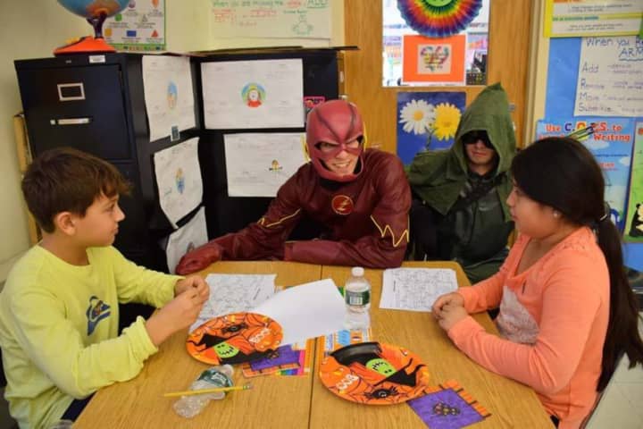 Bronxville High School seniors surprised elementary school students dressed in full costume as part of a district tradition.