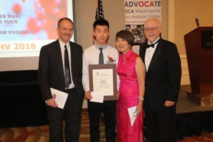 From left: Will Shortz, Kai Zhang, Linda Sledge, Gary Sledge.
