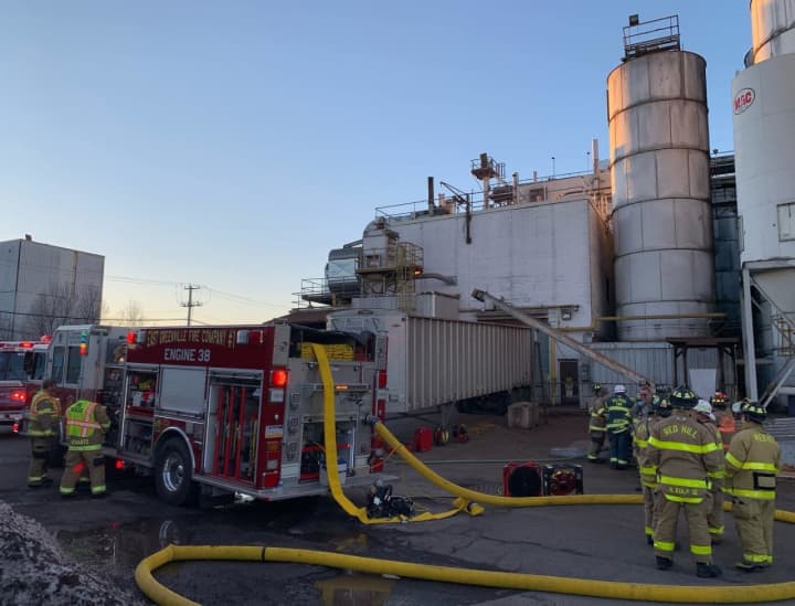 Fire crews battled a building fire at the Blommer Chocolate Factory Tuesday, authorities said.